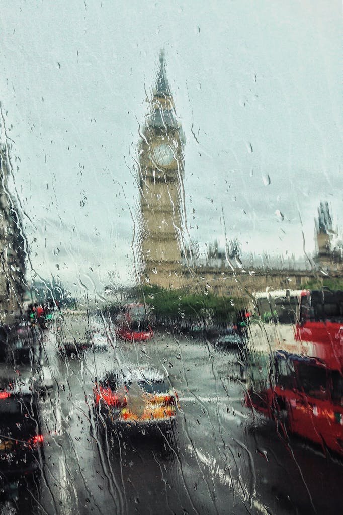 Photo of Water Droplets on Glass Window